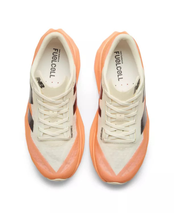 New Balance heren hardloopschoenen oranje FuelCell Rebel v4